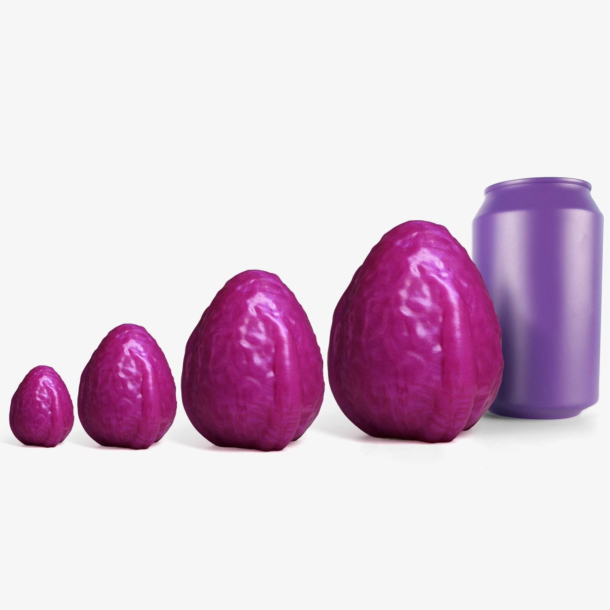 The alien egg ii (set of 3) ben wa balls & egg size comparison next to 330ml can.