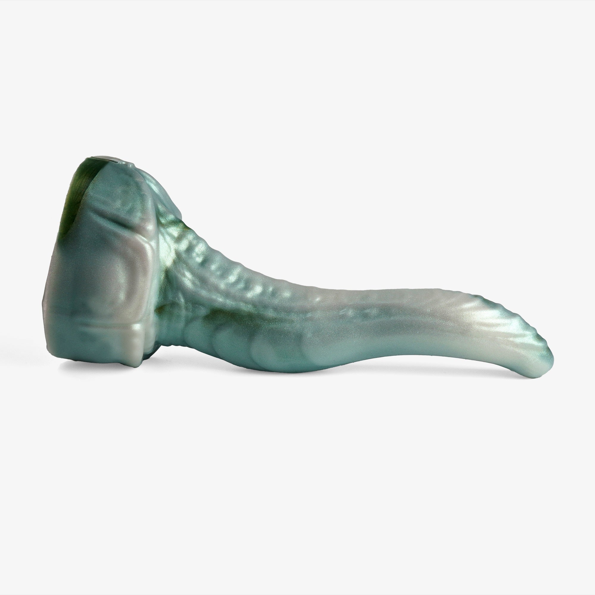 The dragon ii dildo laying down.