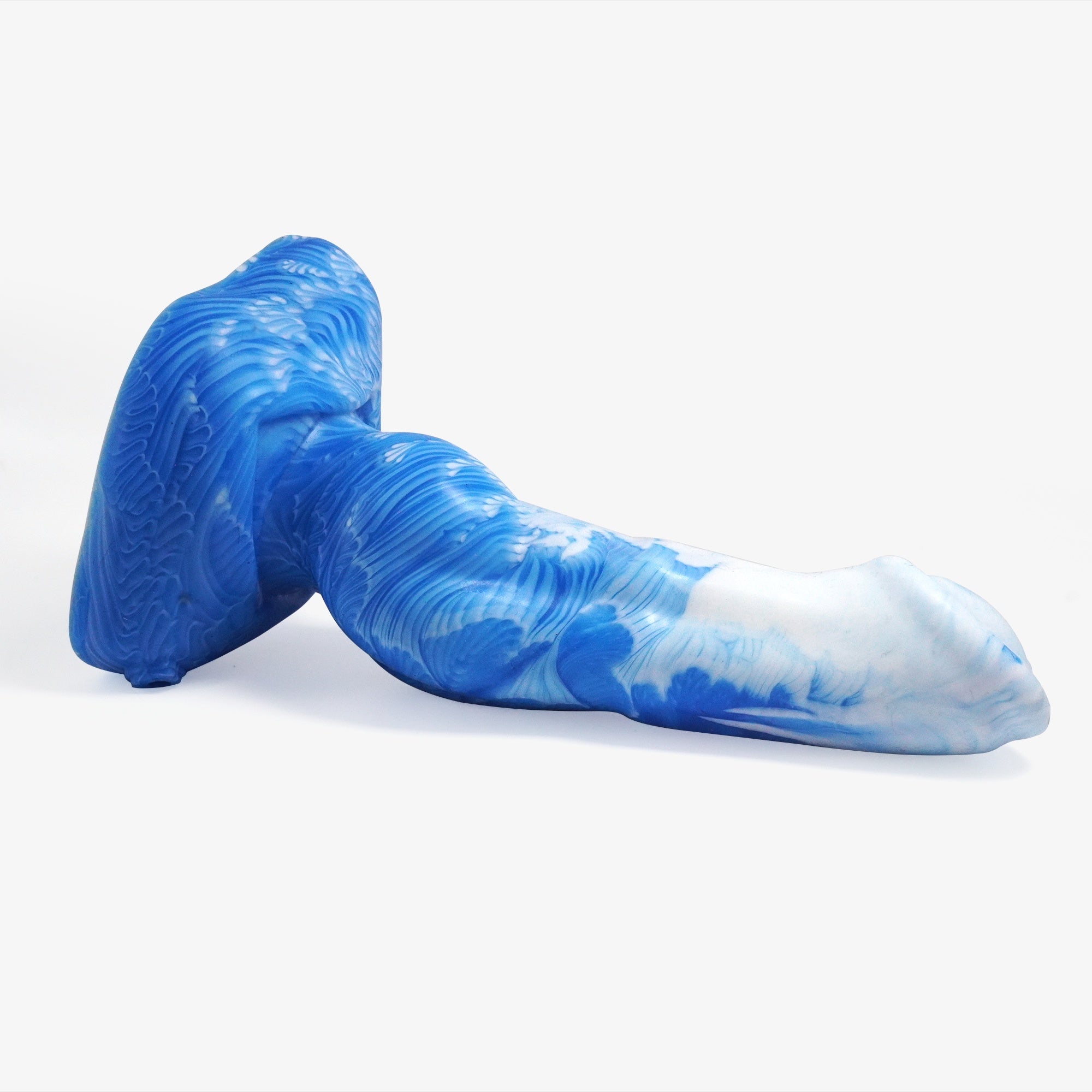 The equiknot dildo laying down.