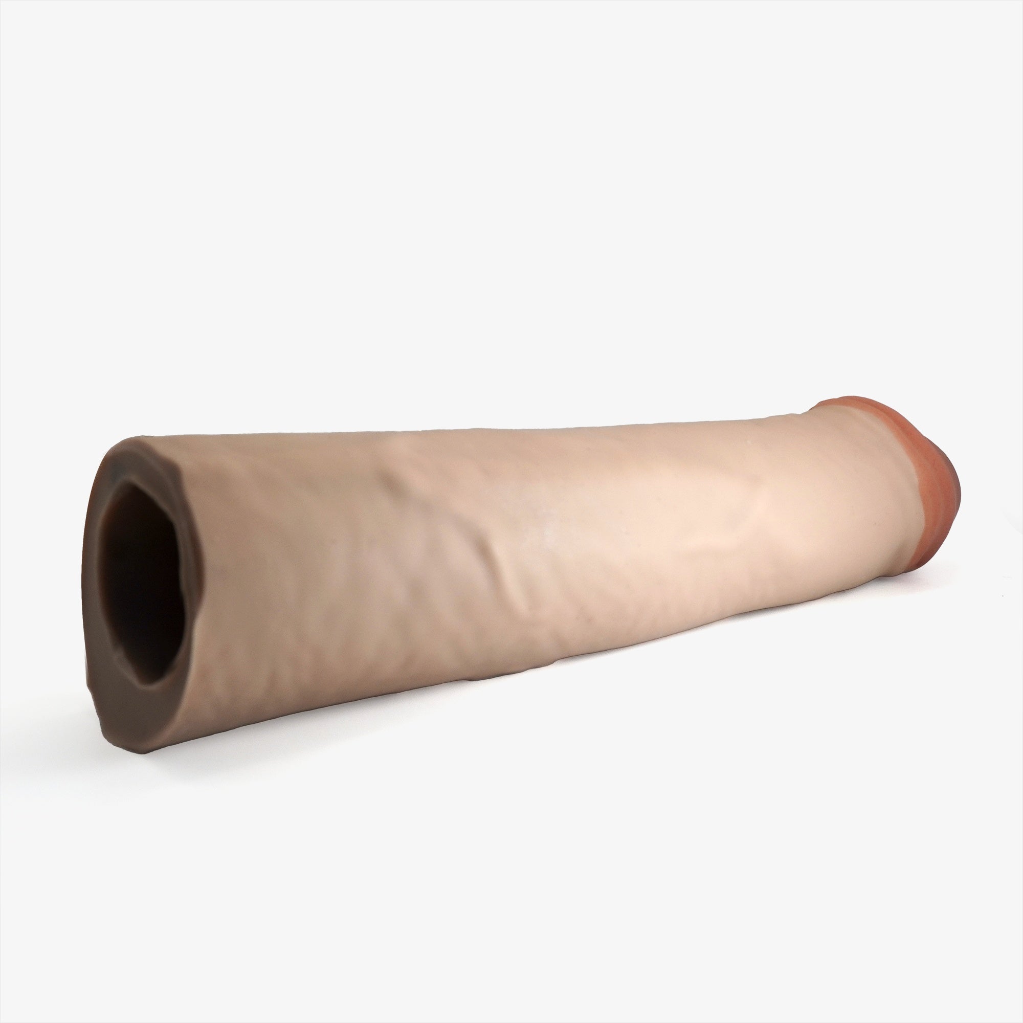 The made to measure slim penis extender laying down.