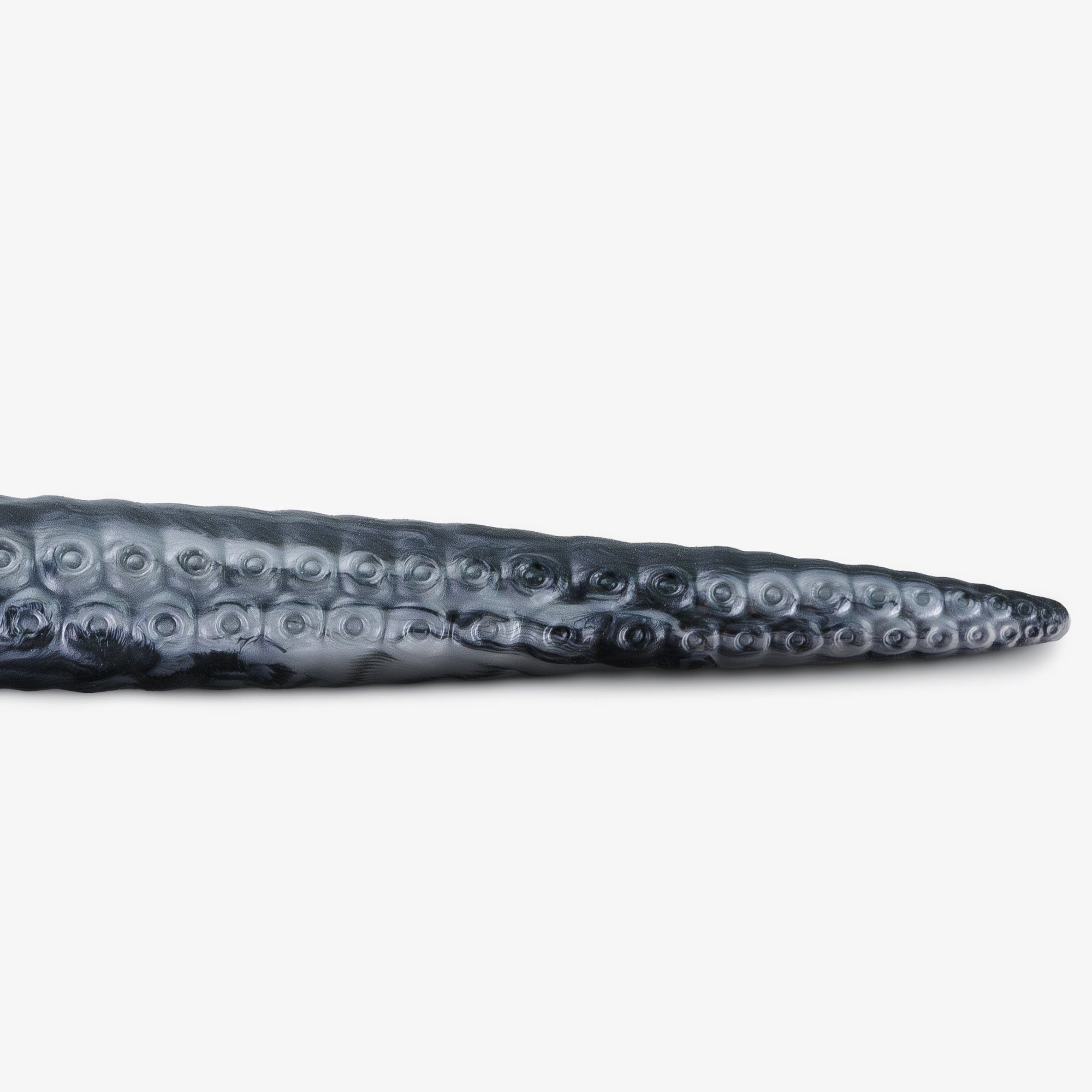 The tentacle depth trainer iii dildo laying down 3.
