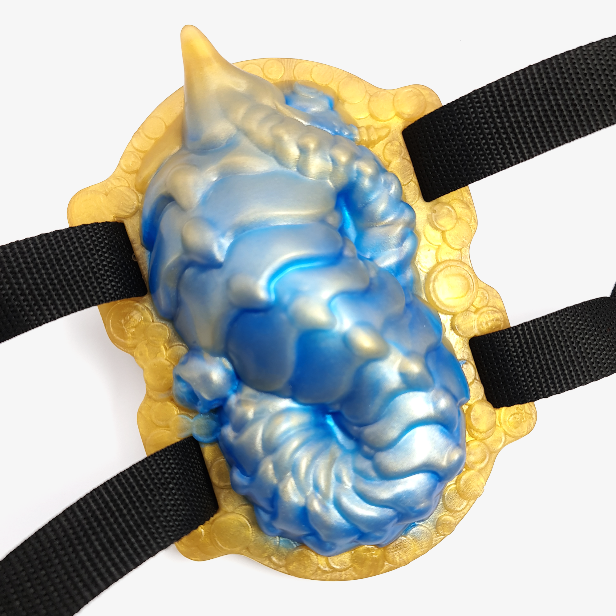 The dragon grinder with straps.