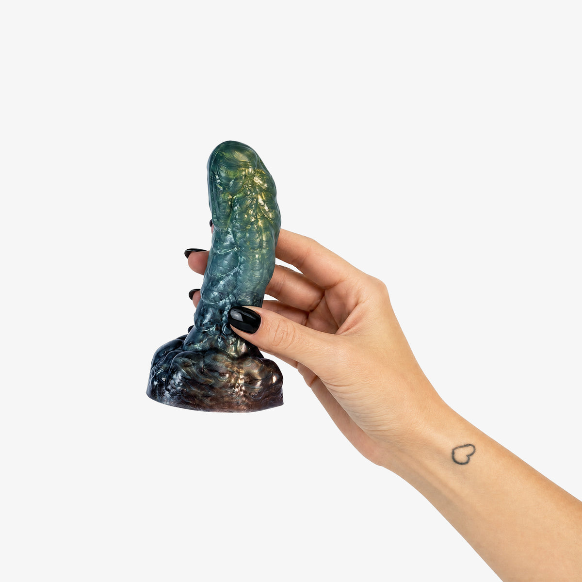 The Golem Dildo, held in hand, platinum-cure silicone dildo