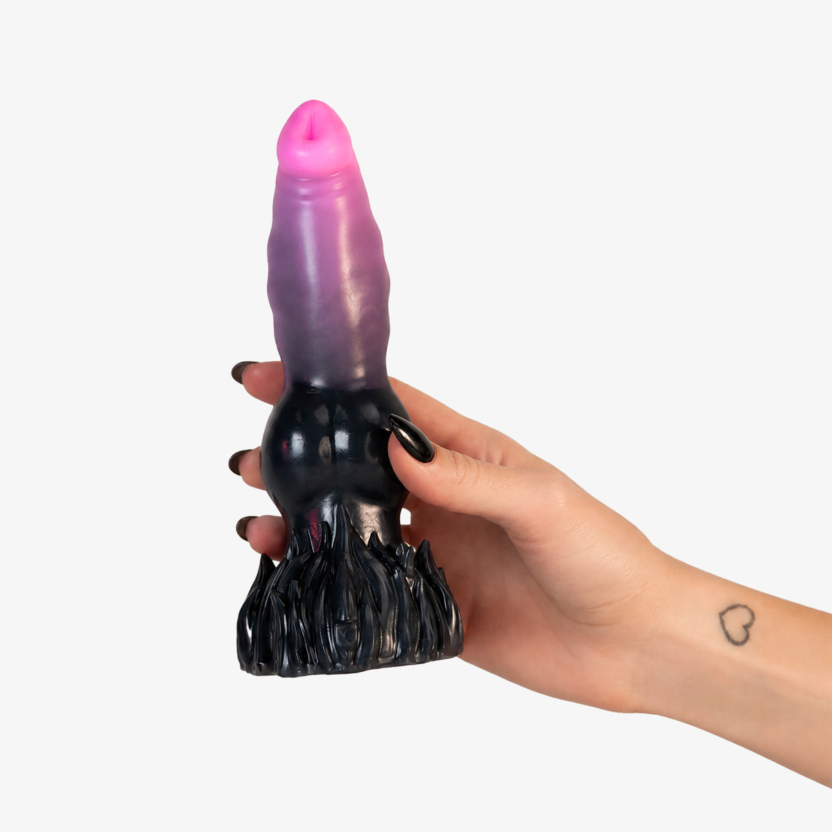The Knot IV Dildo, held in hand, second shot, platinum-cure silicone dildo
